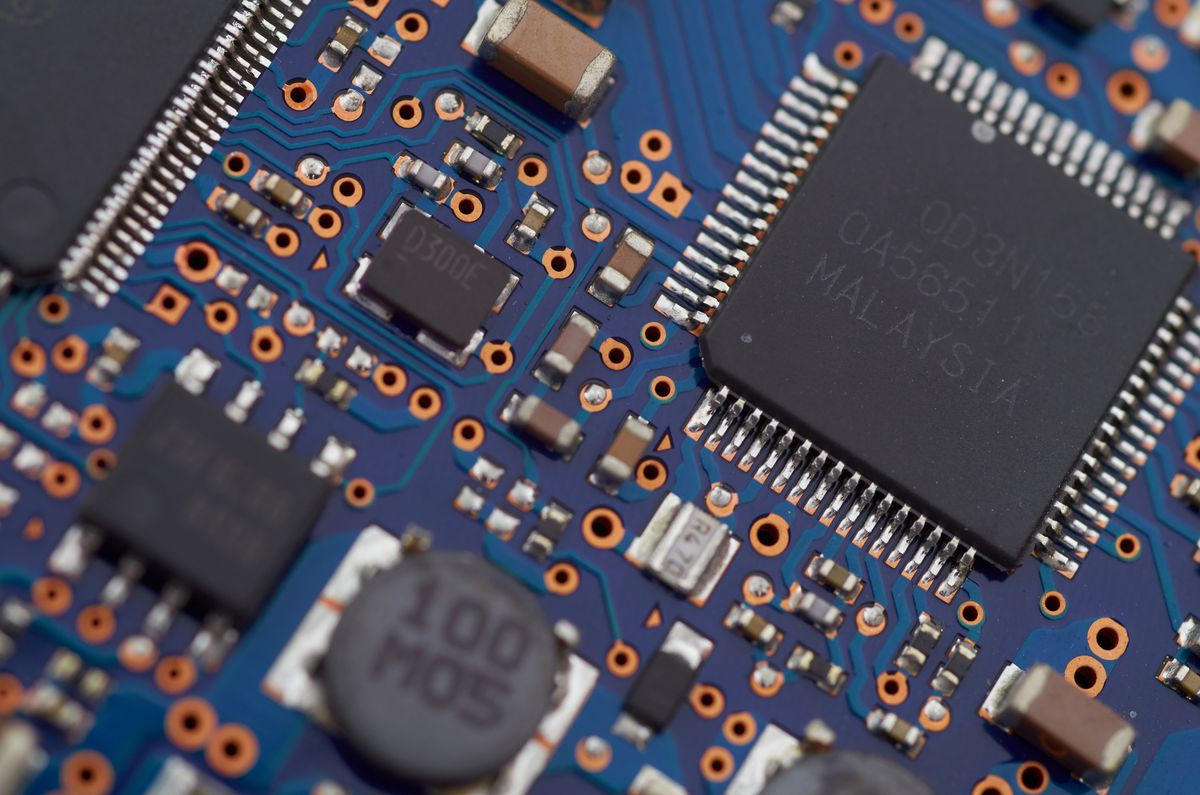 Macro photo of a blue circuit board